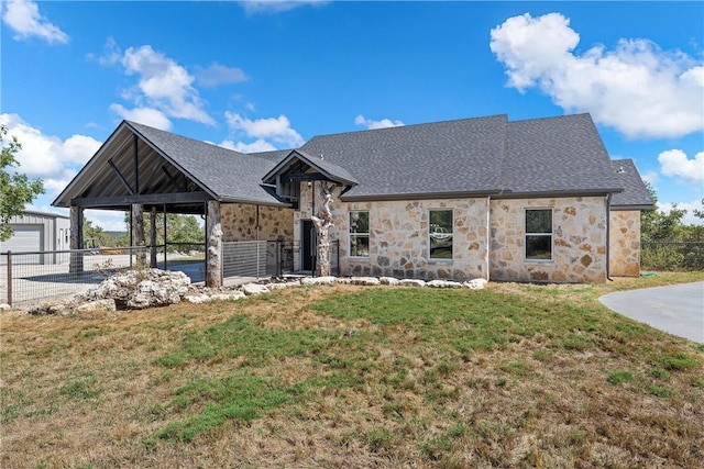 view of front of home with a front lawn