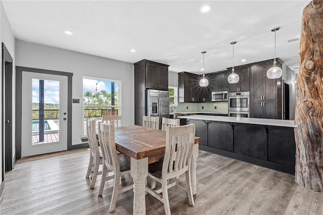 dining room featuring light hardwood / wood-style floors