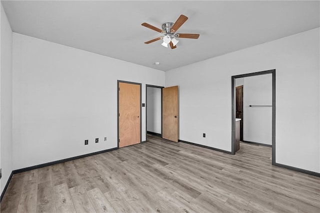 unfurnished bedroom with light hardwood / wood-style floors and ceiling fan