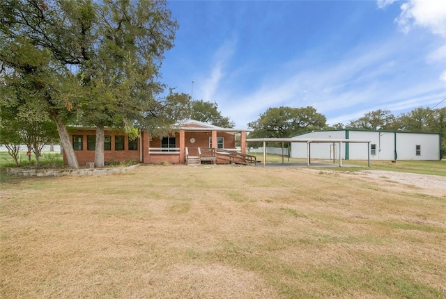 view of yard featuring a carport