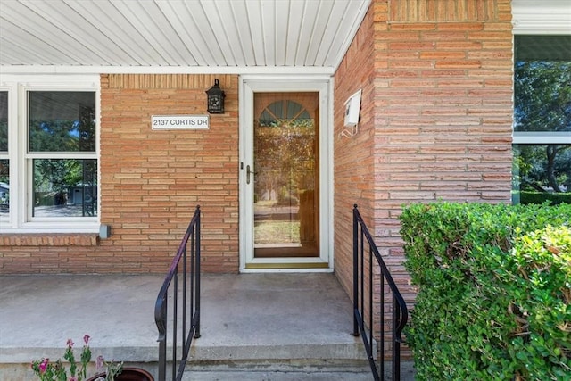 entrance to property with a porch