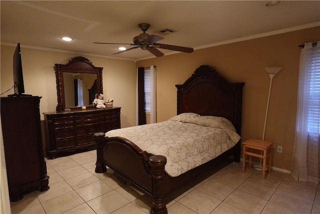 bedroom with ceiling fan and crown molding