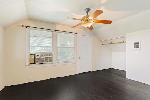 bonus room with ceiling fan, cooling unit, dark hardwood / wood-style floors, and vaulted ceiling