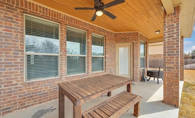 view of patio / terrace featuring a ceiling fan and fence