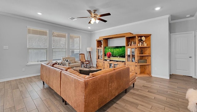 living room featuring a ceiling fan, light wood-style flooring, and baseboards