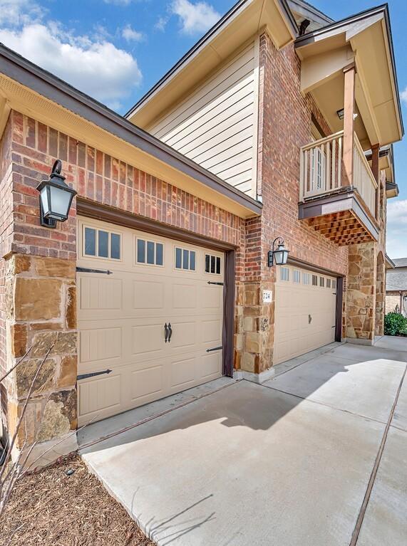 garage with driveway