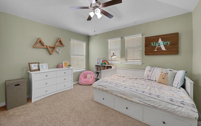 bedroom featuring ceiling fan and carpet flooring