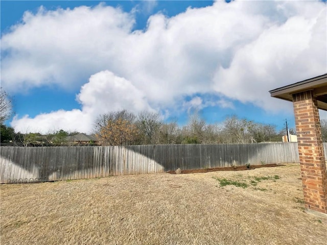 view of yard featuring a fenced backyard