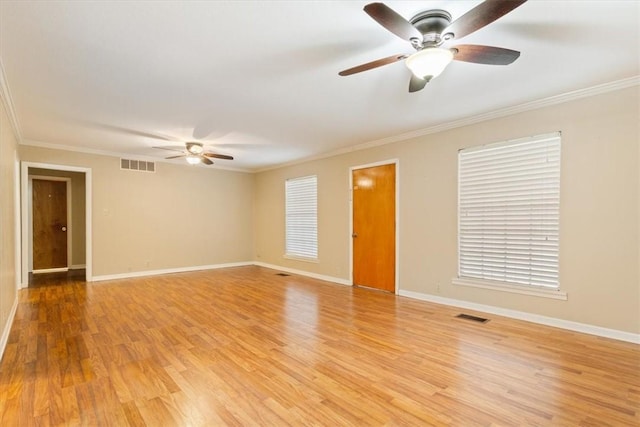 unfurnished room featuring crown molding, ceiling fan, and light wood-type flooring