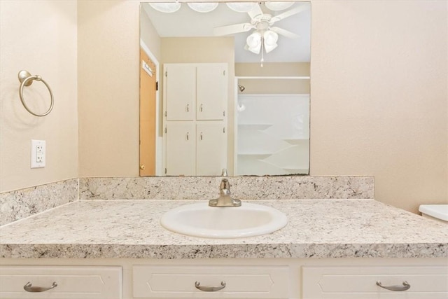 bathroom featuring vanity and ceiling fan