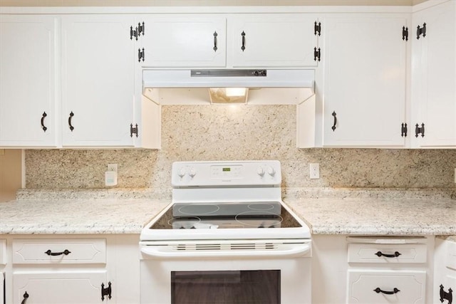 kitchen with white cabinetry, backsplash, and white range with electric stovetop