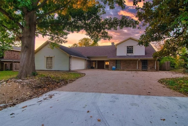 view of front of property with a garage