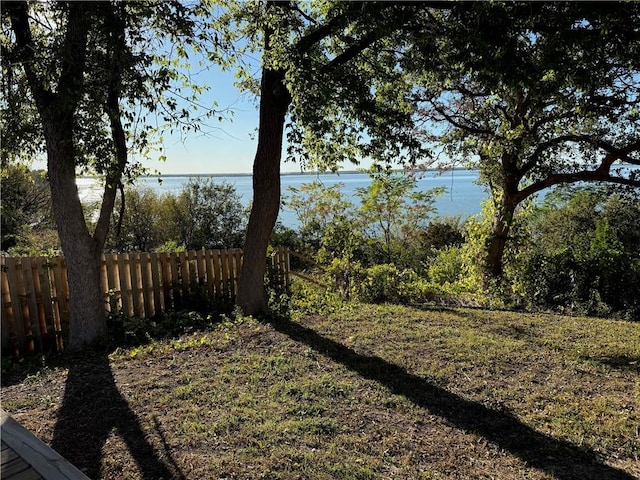 view of yard with a water view