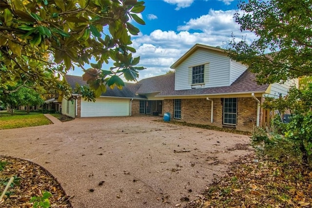 front of property featuring a garage