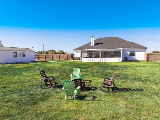 view of yard with a sunroom