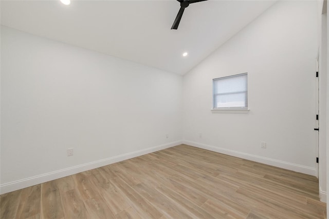 unfurnished room featuring vaulted ceiling, light hardwood / wood-style flooring, and ceiling fan