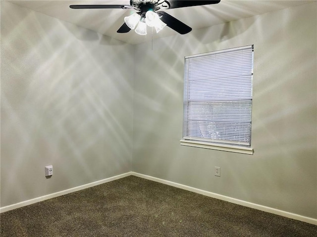 unfurnished room featuring ceiling fan and carpet floors