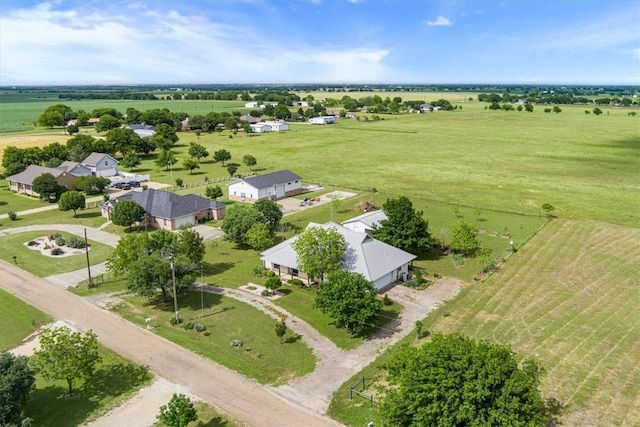 birds eye view of property featuring a rural view