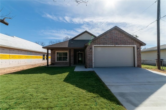 view of front facade with a front yard and a garage