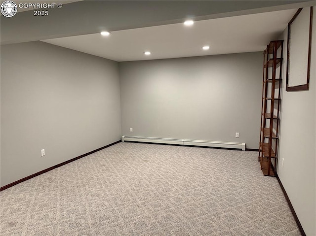 unfurnished room with carpet floors and baseboard heating