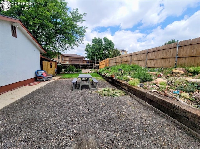 2114 Rangeview Dr, Pueblo, CO 81008 - fenced backyard featuring a patio
