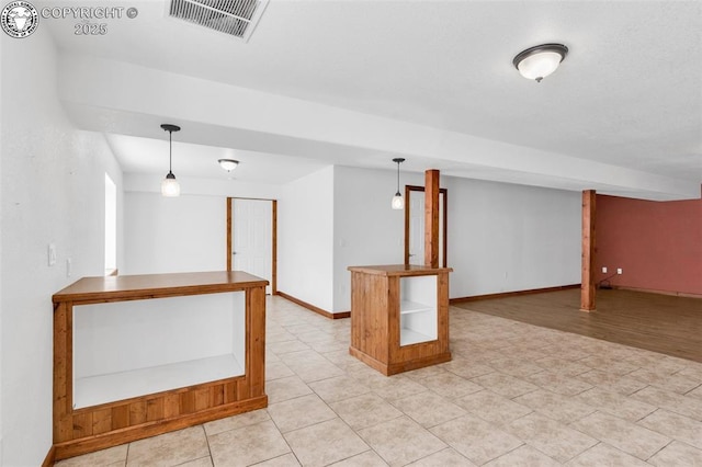 121 Mourning Dove Dr, Canon City, CO 81212 - basement featuring baseboards and light tile patterned flooring