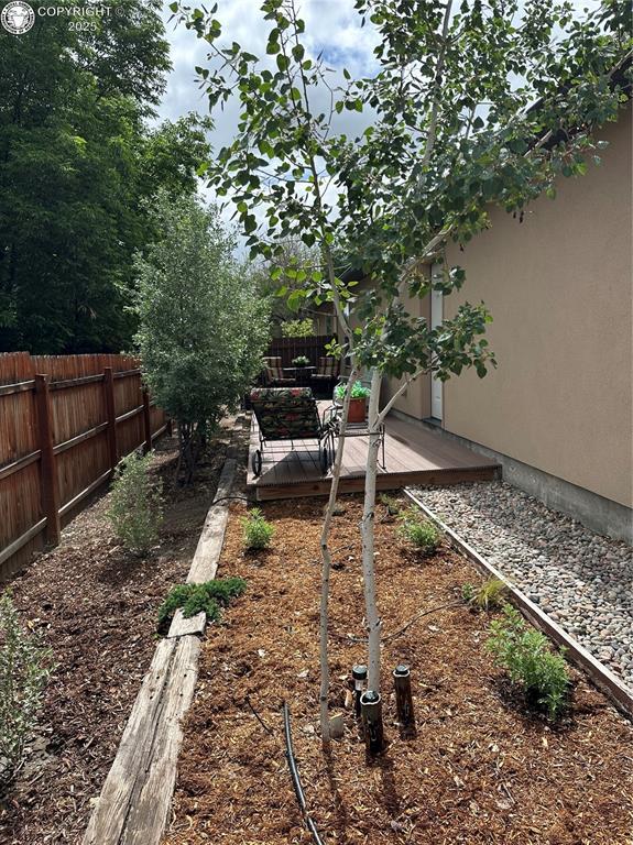 601 Petroleum Ave, Florence, CO 81226 - view of yard with a wooden deck