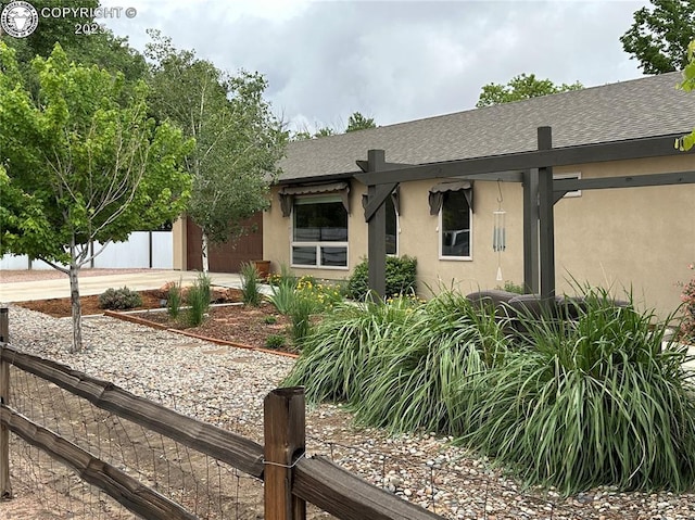 601 Petroleum Ave, Florence, CO 81226 - single story home featuring stucco siding, a shingled roof, and driveway