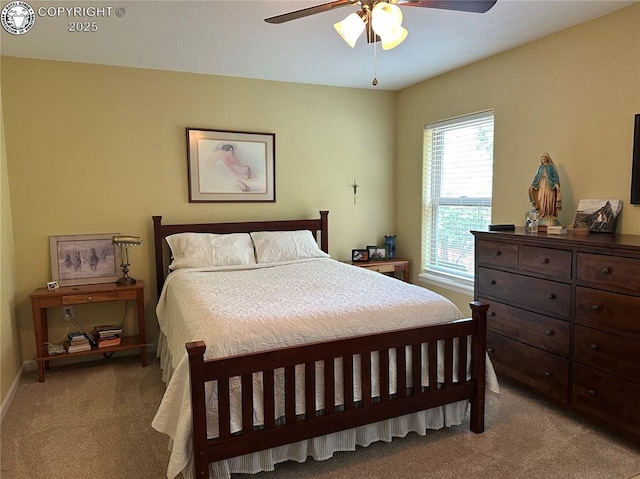601 Petroleum Ave, Florence, CO 81226 - bedroom featuring light colored carpet, baseboards, and a ceiling fan