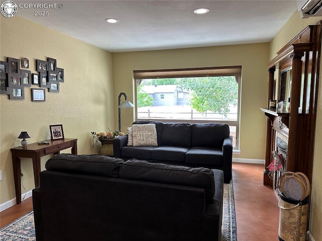 601 Petroleum Ave, Florence, CO 81226 - living area with a wall unit AC, a textured wall, baseboards, and recessed lighting