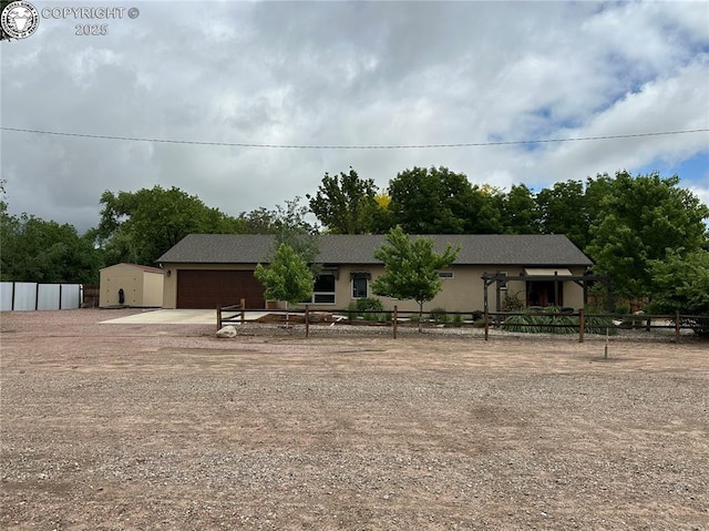 601 Petroleum Ave, Florence, CO 81226 - view of front of home with driveway and a garage