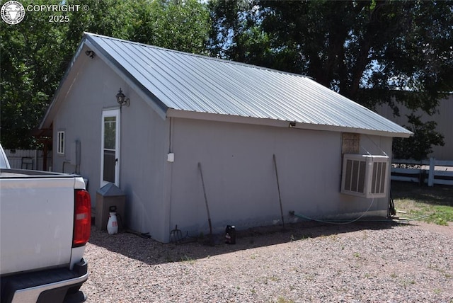 221 Greydene Ave, Canon City, CO 81212 - view of side of home featuring a metal roof and a central air condition unit