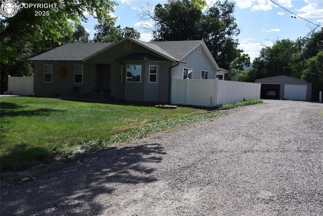 221 Greydene Ave, Canon City, CO 81212 - single story home featuring a garage, an outbuilding, driveway, and roof with shingles