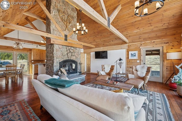 living room featuring a chandelier, wood-type flooring, high vaulted ceiling, and wooden ceiling