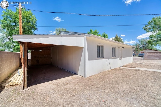 4401 Saint Clair Ave, Pueblo, CO 81005 - view of property exterior with a carport