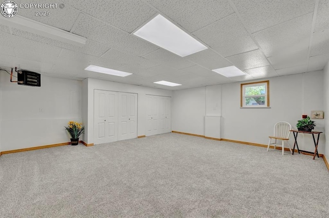 4401 Saint Clair Ave, Pueblo, CO 81005 - below grade area with carpet flooring, baseboards, and a drop ceiling