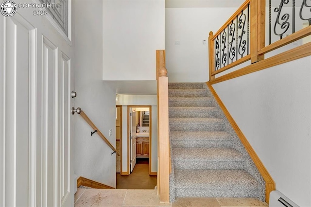 4401 Saint Clair Ave, Pueblo, CO 81005 - staircase featuring baseboard heating