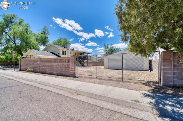 4401 Saint Clair Ave, Pueblo, CO 81005 - view of asphalt street with sidewalks, curbs, and traffic signs