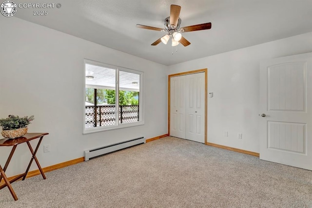 4401 Saint Clair Ave, Pueblo, CO 81005 - spare room with baseboard heating, light colored carpet, ceiling fan, and baseboards