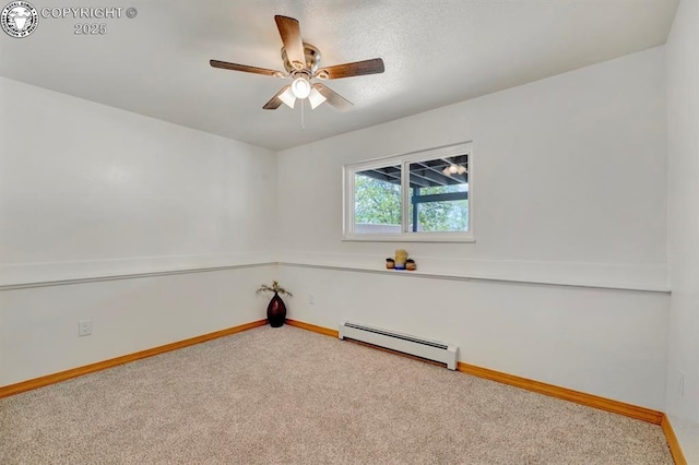 4401 Saint Clair Ave, Pueblo, CO 81005 - carpeted spare room with baseboard heating, ceiling fan, and baseboards