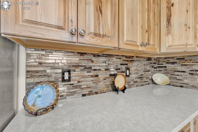 4401 Saint Clair Ave, Pueblo, CO 81005 - kitchen view of light brown cabinetry, light countertops, and decorative backsplash