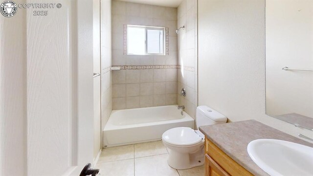 1018 S Camino De Bravo, Pueblo West, CO 81007 - bathroom with vanity, toilet, tile patterned floors, and shower / washtub combination