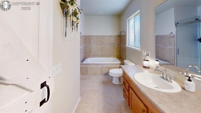 1018 S Camino De Bravo, Pueblo West, CO 81007 - bathroom with vanity, a garden tub, tile patterned flooring, and an enclosed shower