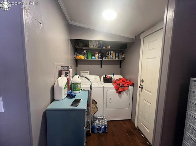 clothes washing area featuring crown molding, dark hardwood / wood-style floors, and independent washer and dryer