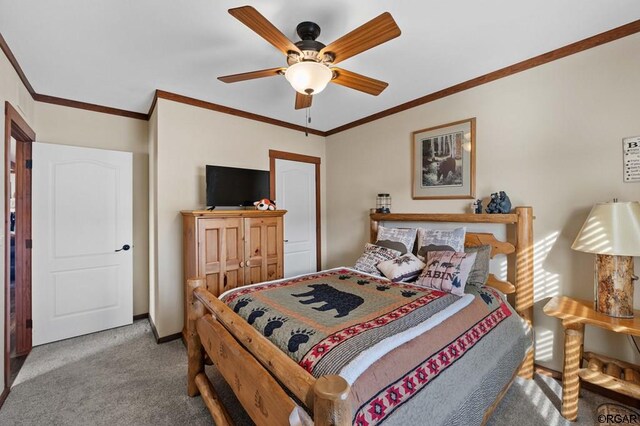 bedroom with ornamental molding, light colored carpet, a closet, and ceiling fan