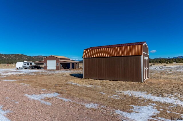 exterior space featuring a mountain view