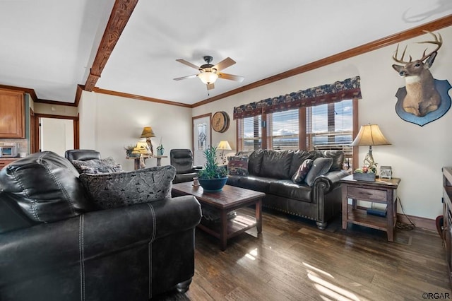 living room featuring beam ceiling, ornamental molding, dark wood-type flooring, and ceiling fan