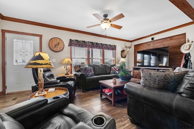 living room featuring dark wood-type flooring, ornamental molding, and ceiling fan