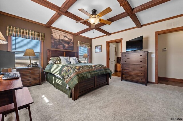 bedroom featuring ceiling fan, coffered ceiling, beam ceiling, and light carpet