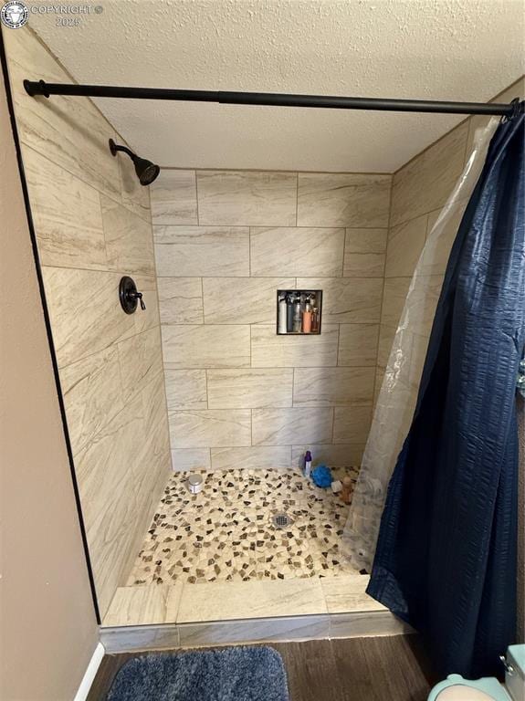 bathroom featuring curtained shower